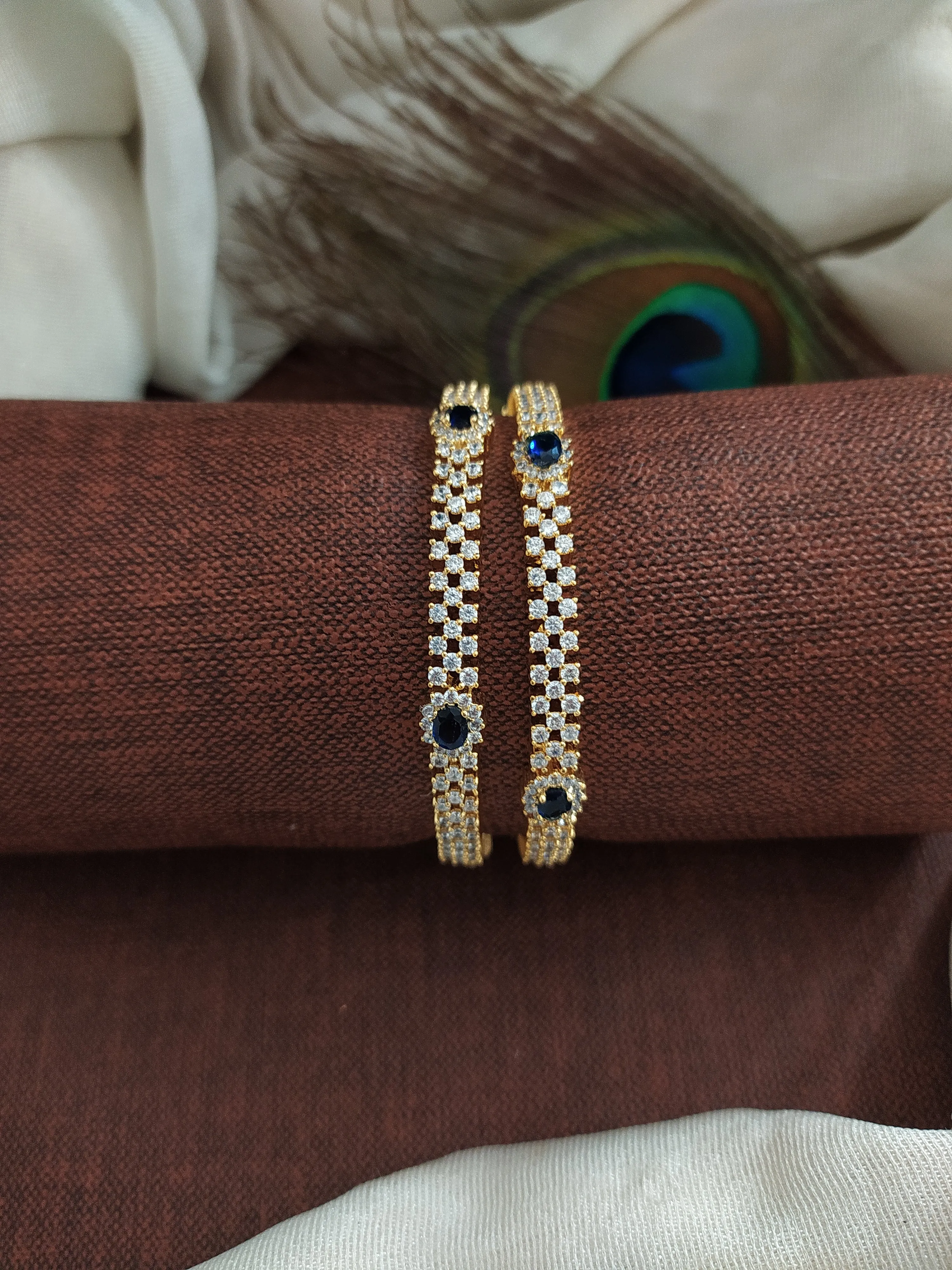 Embrace Coastal Elegance: Gold-Plated Green & Blue Zircοn Bangles