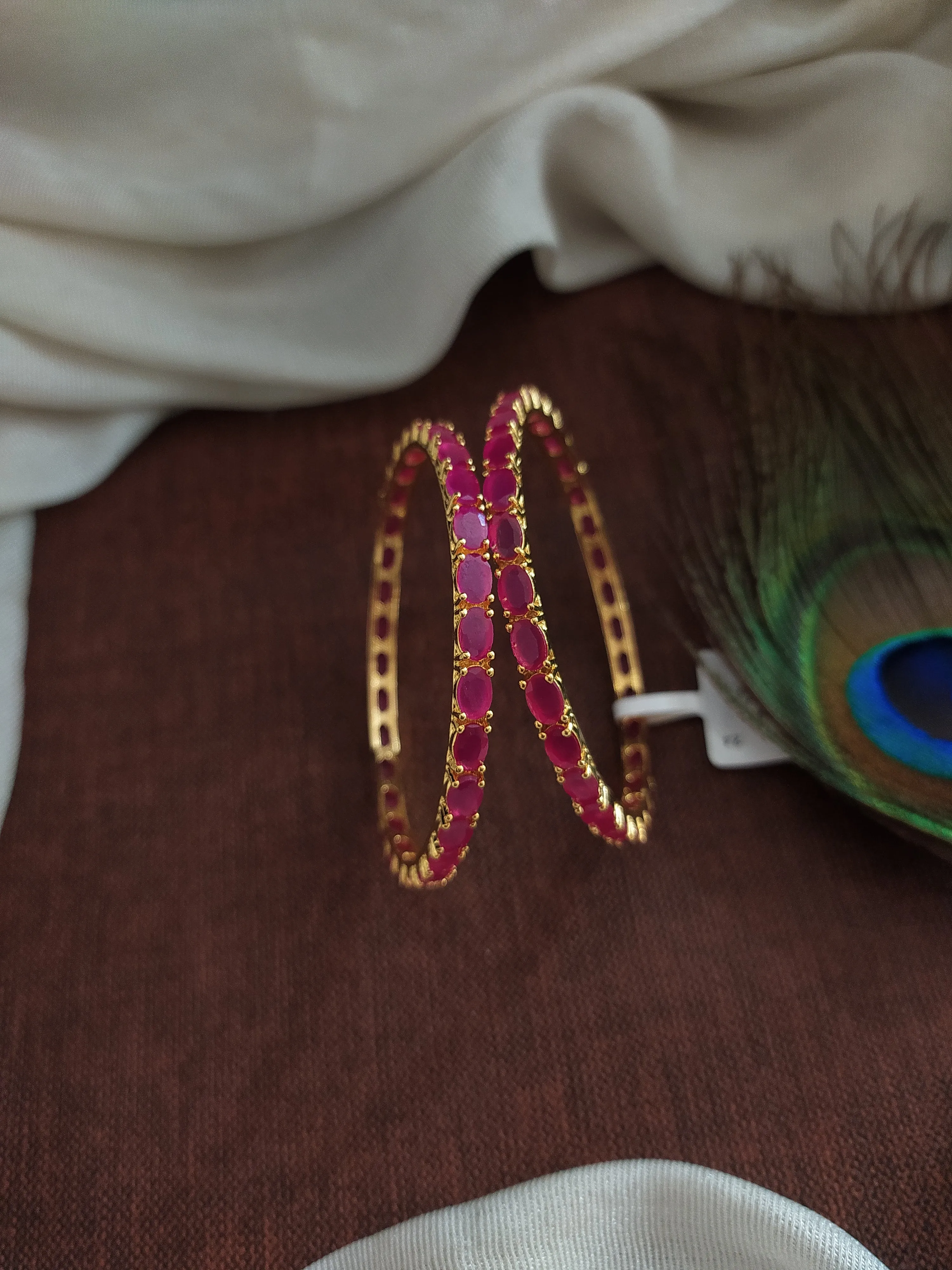 Unleash Your Inner Radiance with Gold-Plated Zircon Bangles with Ruby Elegance